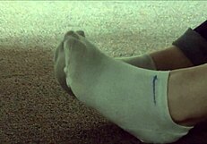 dirty socks hidden in sneakers