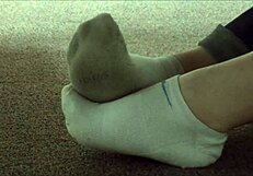 dirty socks hidden in sneakers