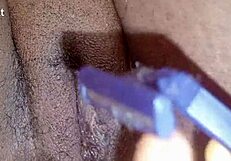 This homemade video captures a steamy shaving session in full detail.