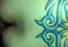 Tattooed princess captured in a casual moment