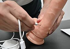 Testing Chinese dildo with remote vibration and heat for top quality