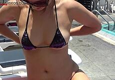 Sexy babe jennymarie flashes wet bikini tits in public outdoor exhibition