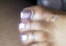 toes teasing a cock with footjob action