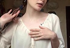 She took off her underwear on camera and showed a smooth pussy