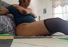 sexy brunette teases with big tits during horny pussy massage