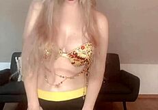 Drag queen performs belly dancing in glasses and music for bimbo fetish celebrity