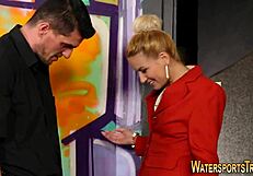 Look at this clothed fetish chick getting peed on after sucking!