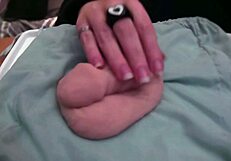 Amateur plays with very soft and limp fake cock in homemade fetish video, no audio.