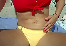 hot blondy playing with pussy on public beach