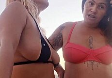 Flashing at the beach with my naughty friend. Ready to take that virgin boy's innocence?