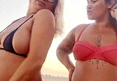 Flashing at the beach with my naughty friend. Ready to take that virgin boy's innocence?