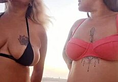 Flashing at the beach with my naughty friend. Ready to take that virgin boy's innocence?