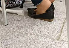 Enjoying shoeplay and dipping in tan nylons with flats