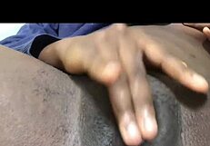 a black girl with a hairy pussy masturbates alone