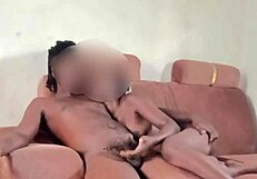 I couldn’t resist playing with my sexy neighbor’s wife’s pussy on the sofa.