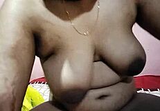 Hot Indian aunty seduces neighbor uncle for steamy Tamil sex. Their raw passion unfolds.