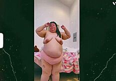 Mature Old Cougar Dances Topless, Showing Off Saggy Tits for the Camera