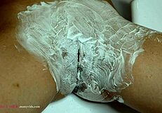 Shaving hairy 18 year old pussy close up