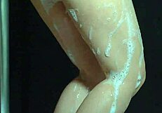 College babes bounce big ass in soapy shower