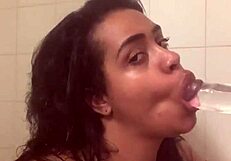 In the Shower, a Whore with Fresh Face and Bare Ass Uses Dildo to Fuck Wet Pussy to Orgasm