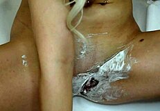 Watch her shave unshaven pussy up close by the pool