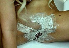 Watch her shave unshaven pussy up close by the pool