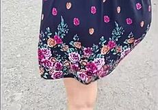 curvy mature woman walks street in skirt