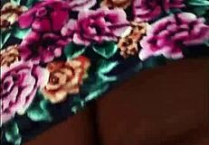 curvy mature woman walks street in skirt