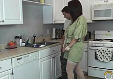 Charlee Chase fucks the plumber in the kitchen, getting a big facial on her tits