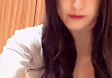 Watch this busty shemale masturbate quietly