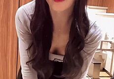 Watch this busty shemale masturbate quietly