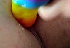 brunette amateur uses rainbow dildo for anal gaping creampie!
