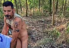 group of friends having an outdoor gathering with games and drinks on the trails