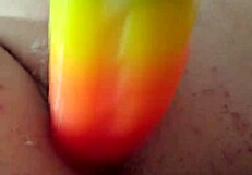 brunette amateur uses rainbow dildo for anal gaping creampie!