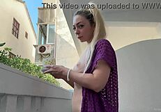 Wow, blonde beauty flashing naked on the balcony!