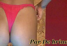 two sluts check out a giant toy together.