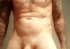 Feeling the thrill of solo pleasure in the shower with a massive cock.