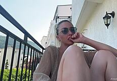 hey, check out these natural boobs flashing on the balcony