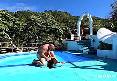 Tattooed latina getting freaky by the pool