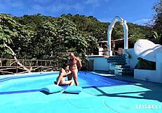 Tattooed latina getting freaky by the pool