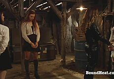 The busty lesbian slave is handtied and getting fingered by her mistress.