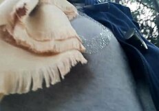 I whisper, 'look at my tits' in the public garden, then pee in my tight pants