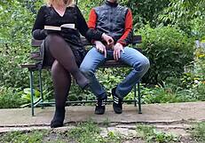 Curvy step mother satisfies step son outdoors with handjob