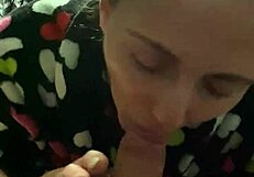 She kneels at the desk for a wet blowjob, sucking big cock in POV until cum in mouth during game.