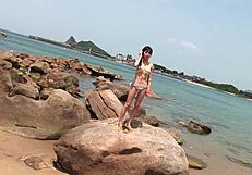 Skinny Japanese Chick Enjoys Photoshoot On The Beach