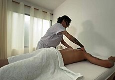 Big ass brunette masseuse gets horny with her huge cock client!