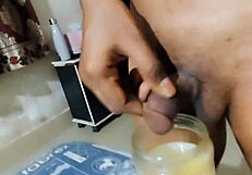 Hey, watch this muscular cheerleader in skirt tease with toys on desk