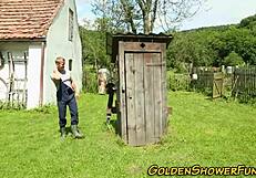 redhead gets pissed and cummed on outdoors