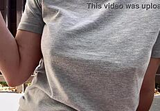 Italian MILF smokes outdoors, big tits exposed!