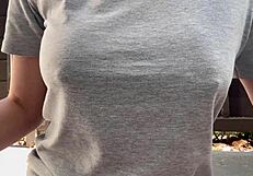 Italian MILF smokes outdoors, big tits exposed!